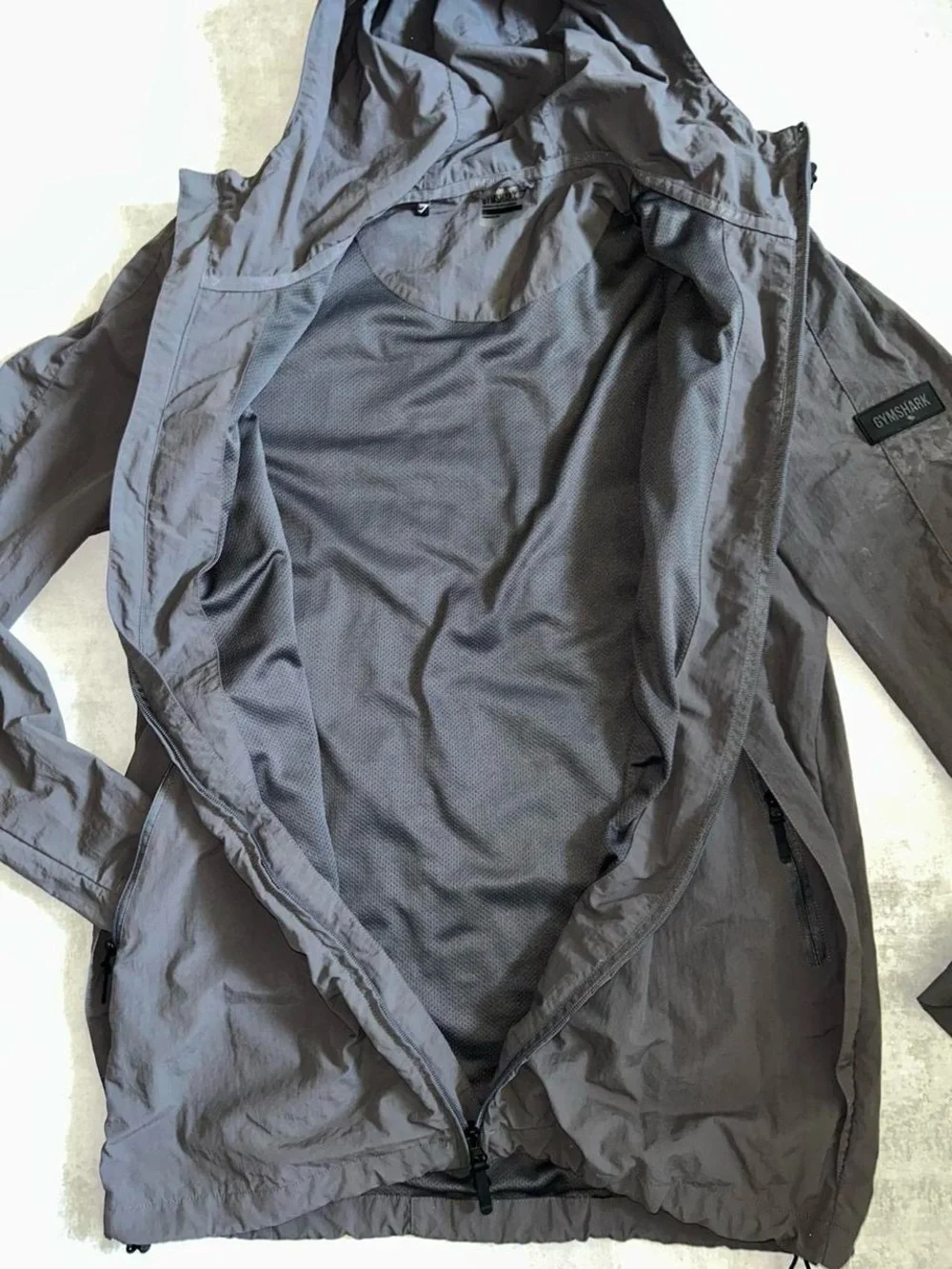 Gymshark Lightweight Hooded Jacket in Charcoal